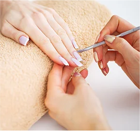Spa manicure woman nail salon receiving manicure by beautician
